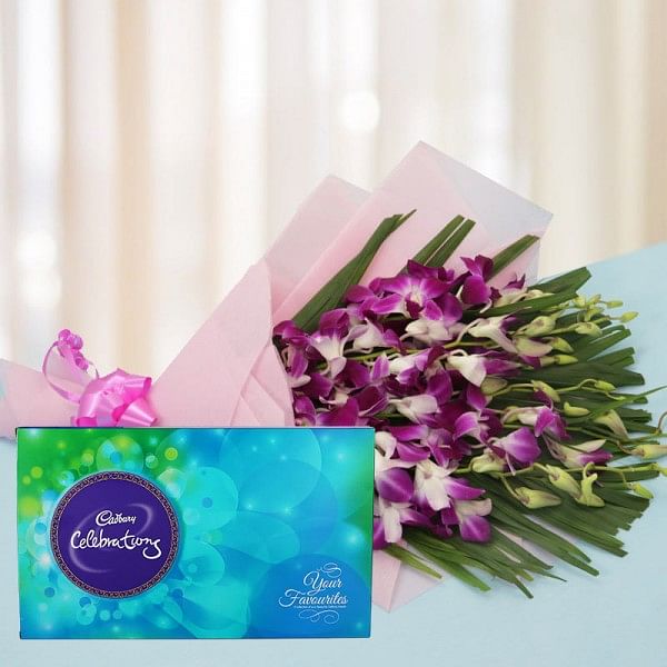  6 Purple Orchids in Pink Paper Packing, Pink Bow with 1 Cadbury Celebrations Pack (131.3gms)